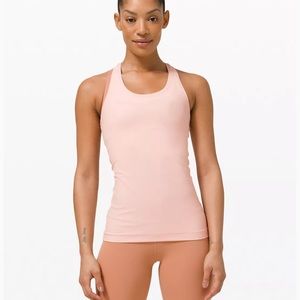 Two lulu lemon tight fit athletic tank tops